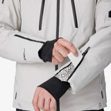 Light grey insulated jacket with black cuff panels, front zippers, and utility pocket openings.