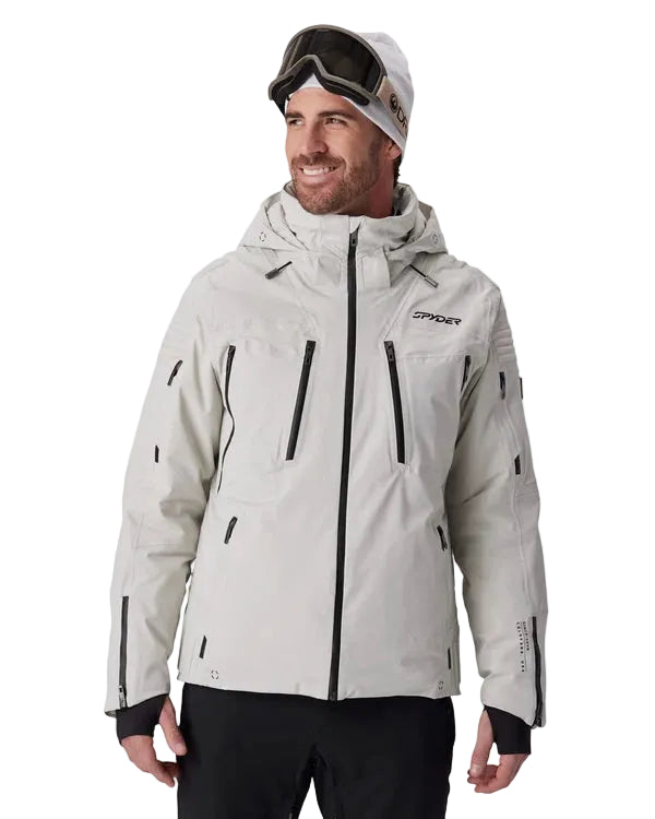 Light grey insulated ski jacket with hood, full front zipper, front pockets, Spyder logo.