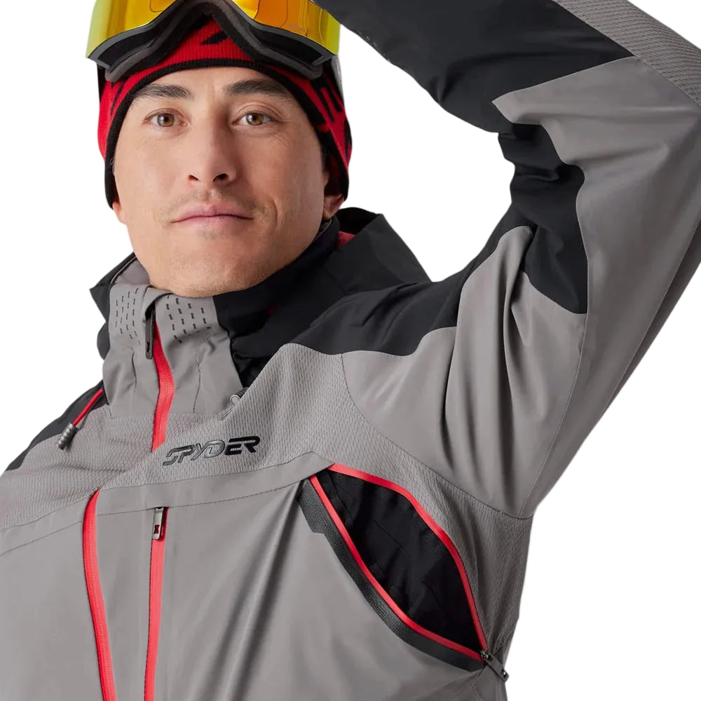Insulated ski jacket front view, gray with black accents and red piping, hooded