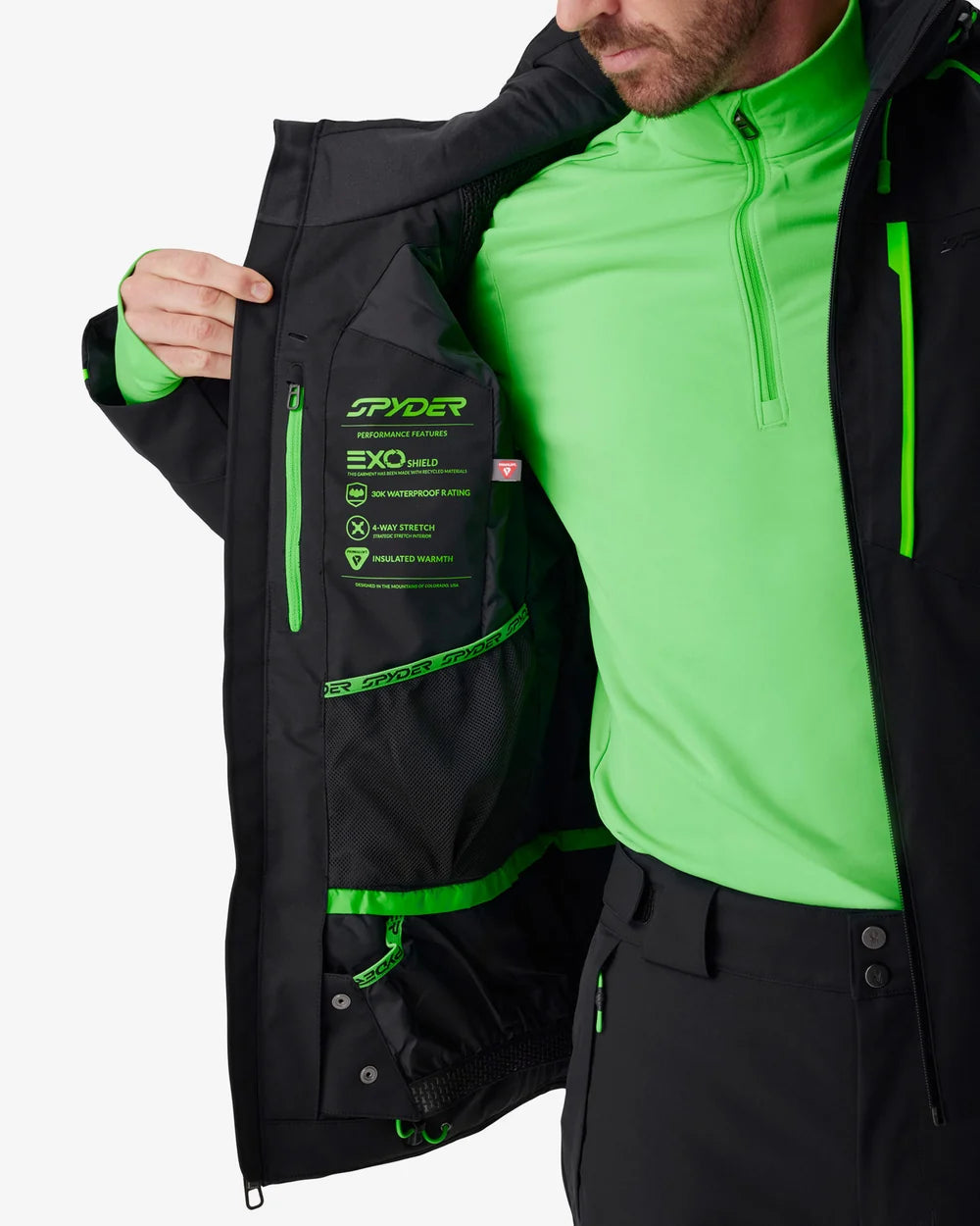 Black insulated jacket with bright green zipper and interior pocket graphics