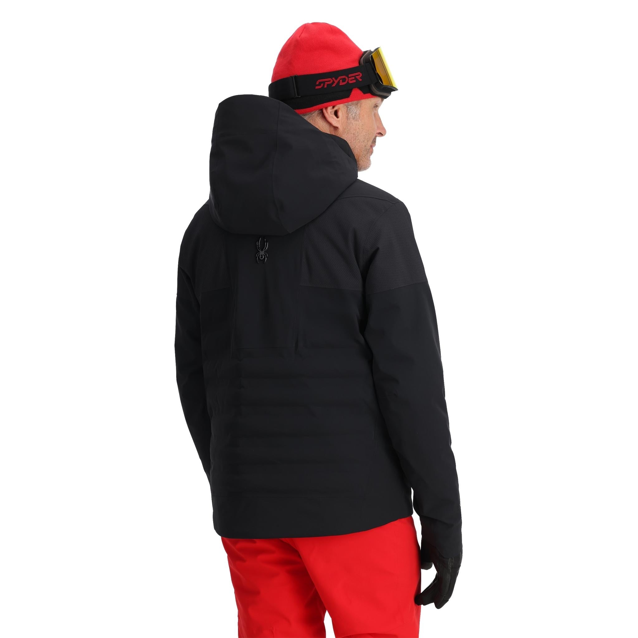 Spyder Pinnacle Insulated Jacket 2025 - A black jacket with a hood, featuring a small embroidered logo on the upper back.
