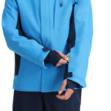 Spyder Primer Insulated Jacket - A light blue jacket with a black spider logo on the chest and black accents down the sides.
