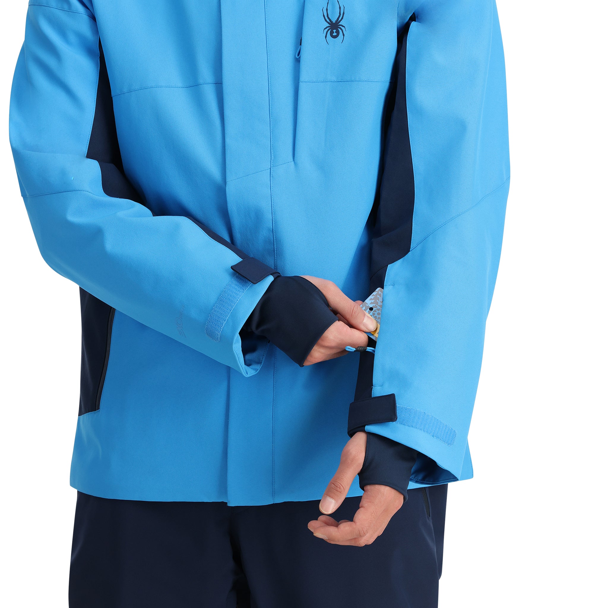 Spyder Primer Insulated Jacket - A light blue jacket with a black spider logo on the chest and black accents down the sides.