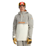 Spyder Men's All Out Insulated Anorak Jacket 2025 - A grey and white jacket with orange accents, featuring a hood and zippered pockets.