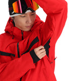 Spyder Copper Insulated Jacket - A red jacket with black accents, featuring a copper-colored zipper and a hood.
