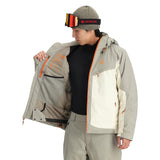 Spyder Copper Insulated Jacket - A tan jacket with copper-colored accents on the zipper and logo, featuring a hood and zippered pockets.