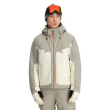 Spyder Copper Insulated Jacket - A tan jacket with copper-colored zipper pulls and a small orange logo on the left chest.