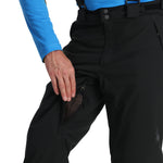 Spyder Men's Boundary Insulated Pants - Black pants with a zippered pocket on the right thigh and a black logo on the left leg.