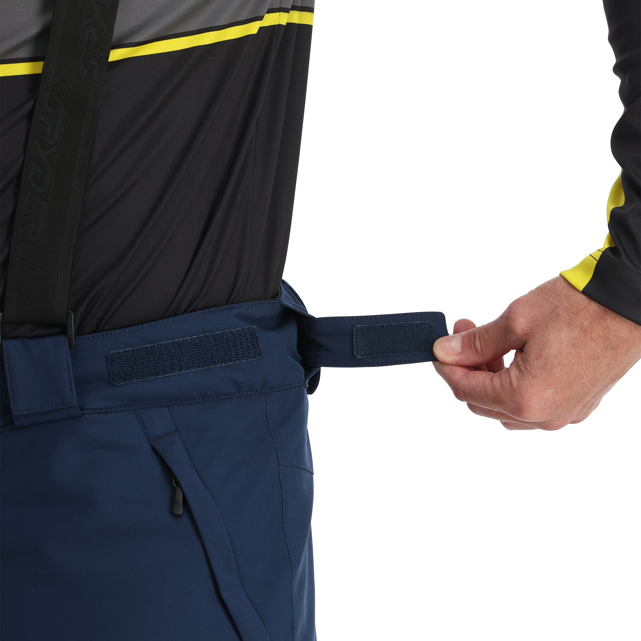 Spyder Men's Boundary Insulated Pants - Black pants with yellow stripe on waistband and black zipper fly.