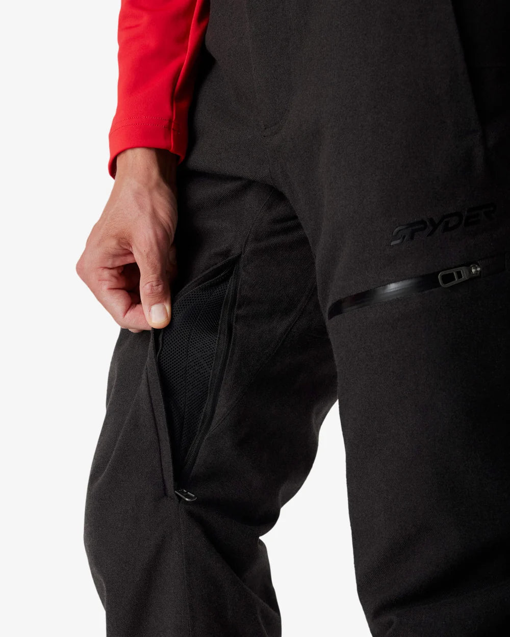 Insulated ski pants with black mesh pocket and side zip opening