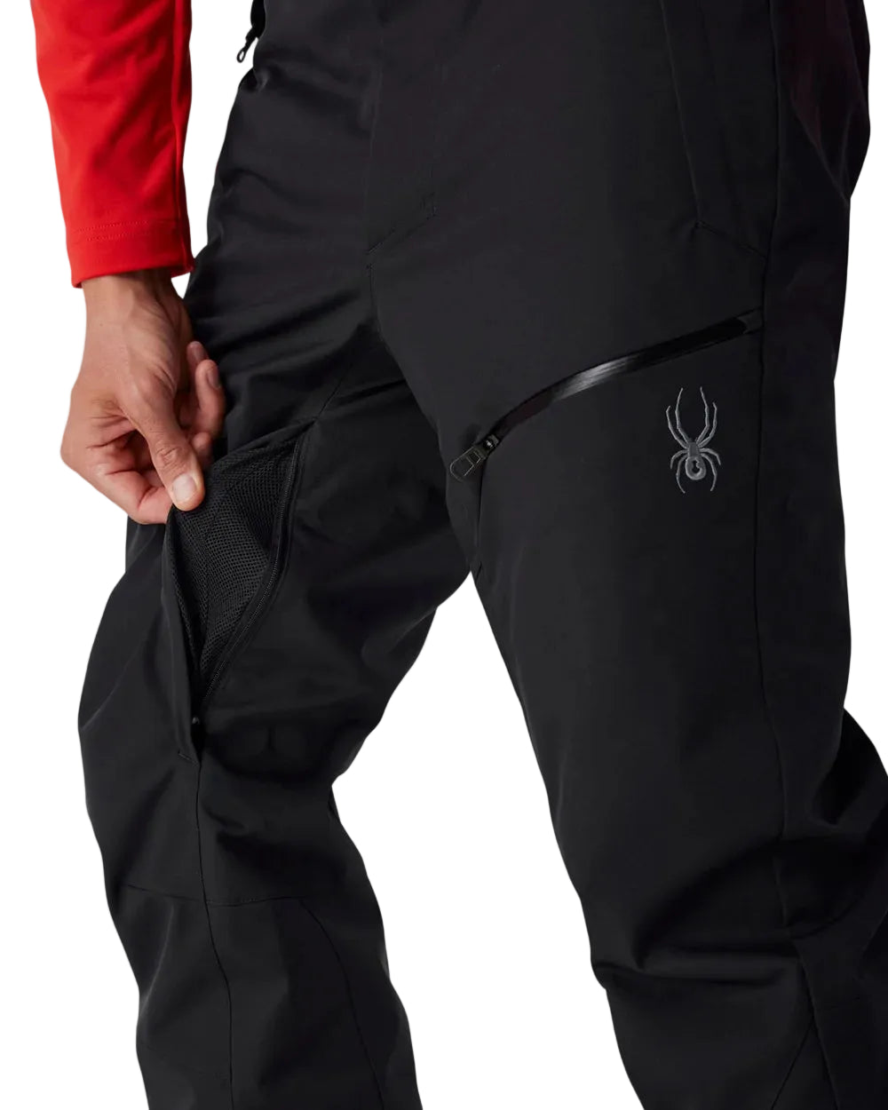 Black insulated ski pants with cargo flap pocket and small thigh logo