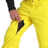 Spyder Men's Dare Insulated Pant - Black pants with a subtle white stripe down the side of each leg, featuring a zippered fly and two front pockets.