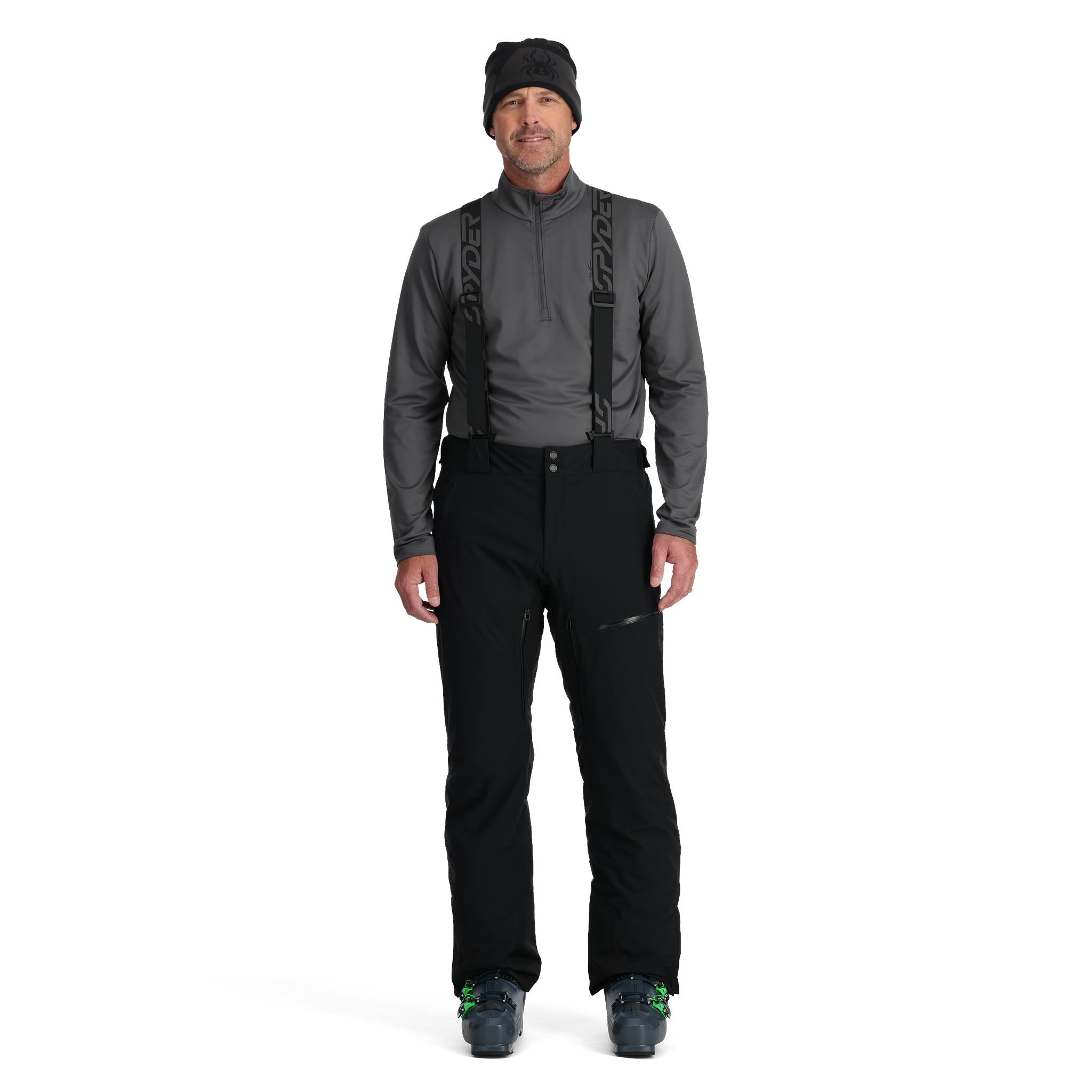 Spyder Men's Dare Insulated Pant Tall - Black ski pants with a subtle pattern of thin white lines on the left leg, and black suspenders attached to the shoulders.