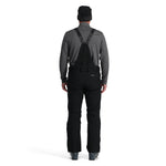 Spyder Men's Dare Insulated Pant Tall 2025 - Black snow pants with a subtle pattern of thin white lines on the left leg, worn by a model from behind.
