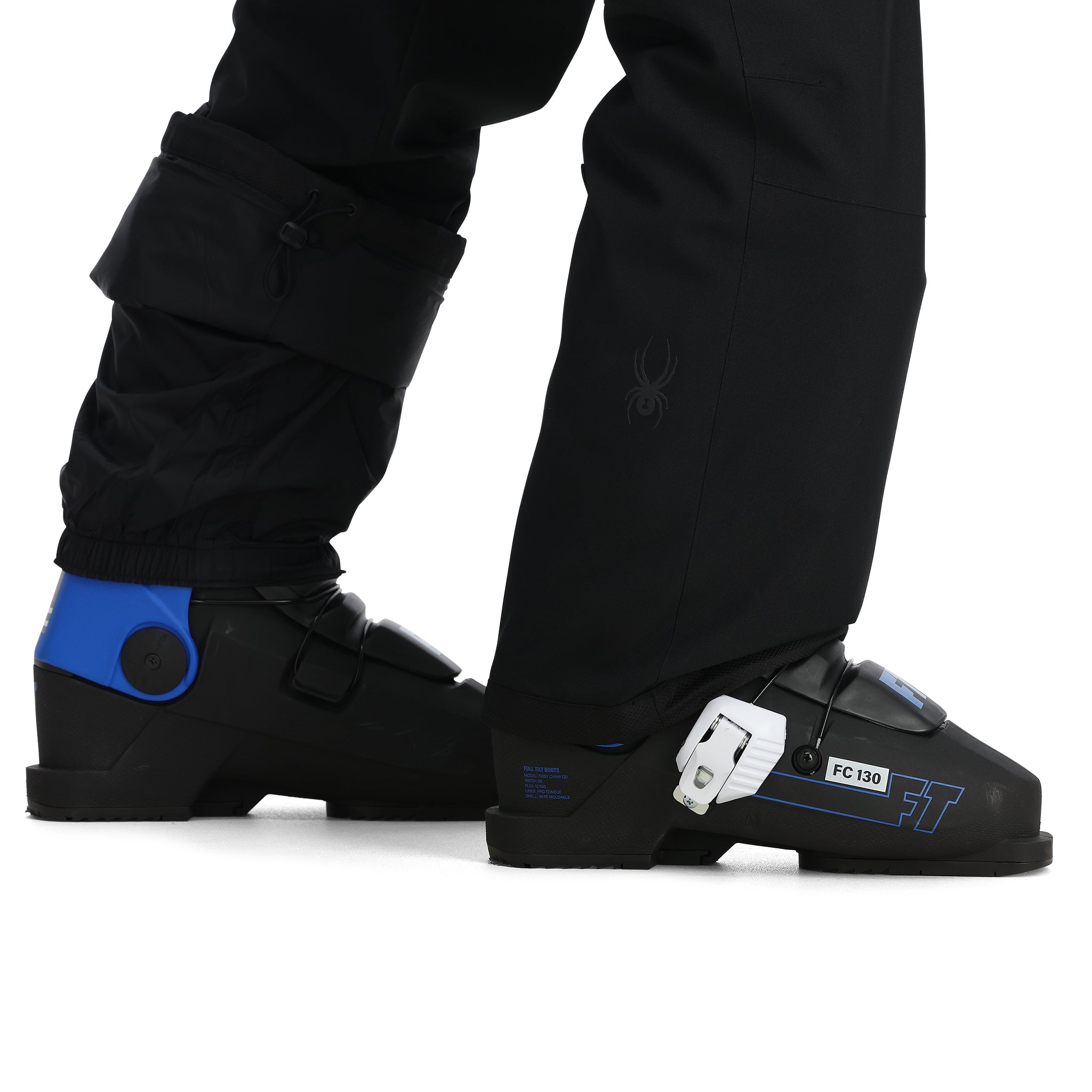 Spyder Men's Terrain Insulated Bib Pants - Black bib pants with a subtle pattern of small, dark gray snowflakes on the upper thigh area.