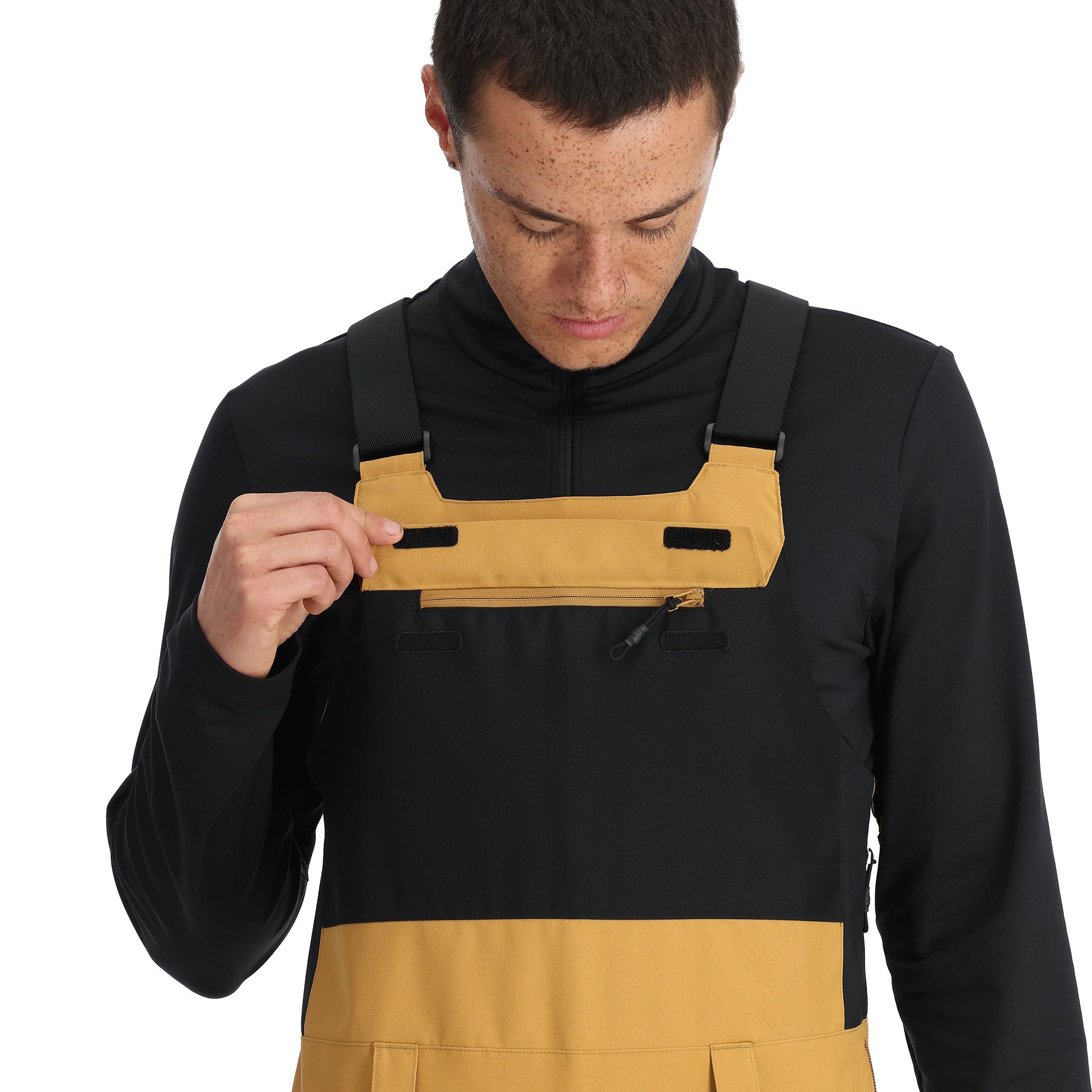 Spyder Men's Terrain Insulated Bib Pants - A pair of insulated bib pants with a black and grey color scheme, featuring a zippered fly closure on the front.