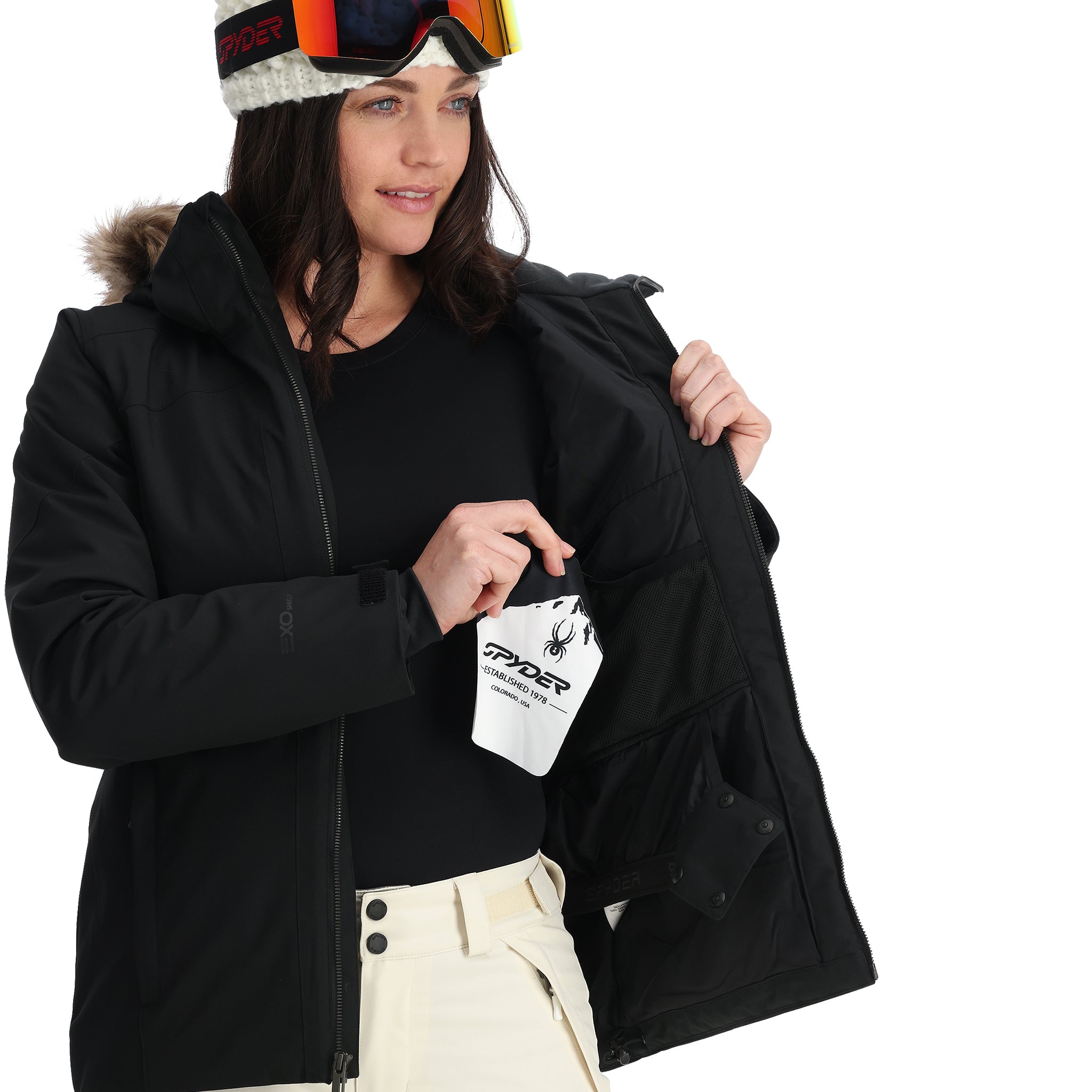 Spyder Women's Skyline Insulated FF Jacket - A black jacket with a fur-lined hood, featuring a zipper and two zippered pockets on the front.