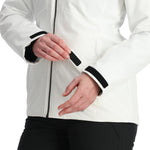 Spyder Women's Skyline Insulated FF Jacket 2025 - A white jacket with a black zipper and black trim on the hood, cuffs, and pockets.