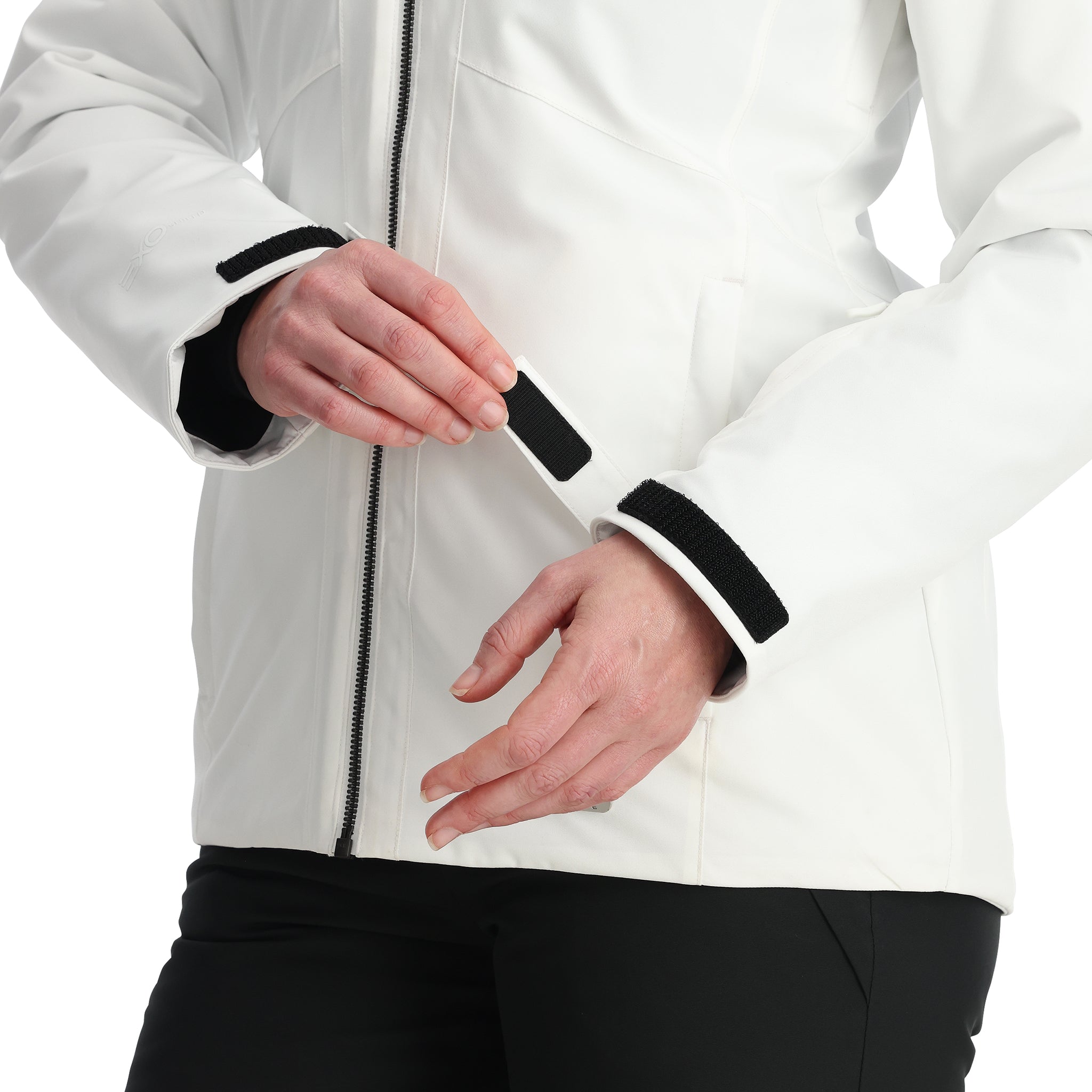 Spyder Women's Skyline Insulated FF Jacket 2025 - A white jacket with a black zipper and black trim on the hood, cuffs, and pockets.