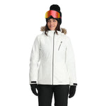 Spyder Women's Skyline Insulated FF Jacket - A white jacket with a fur-lined hood, featuring a zippered chest pocket and two side pockets.
