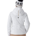 Women’s insulated white ski jacket with hood and faux-fur pom, center-back detail