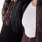 Insulated jacket lining with Spyder logo and white zipper, open front view