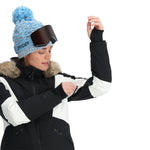 Spyder Women's Vida Insulated Faux Fur Jacket 2025 - A black and white jacket with a faux fur-lined hood, featuring a zippered front and two side pockets.