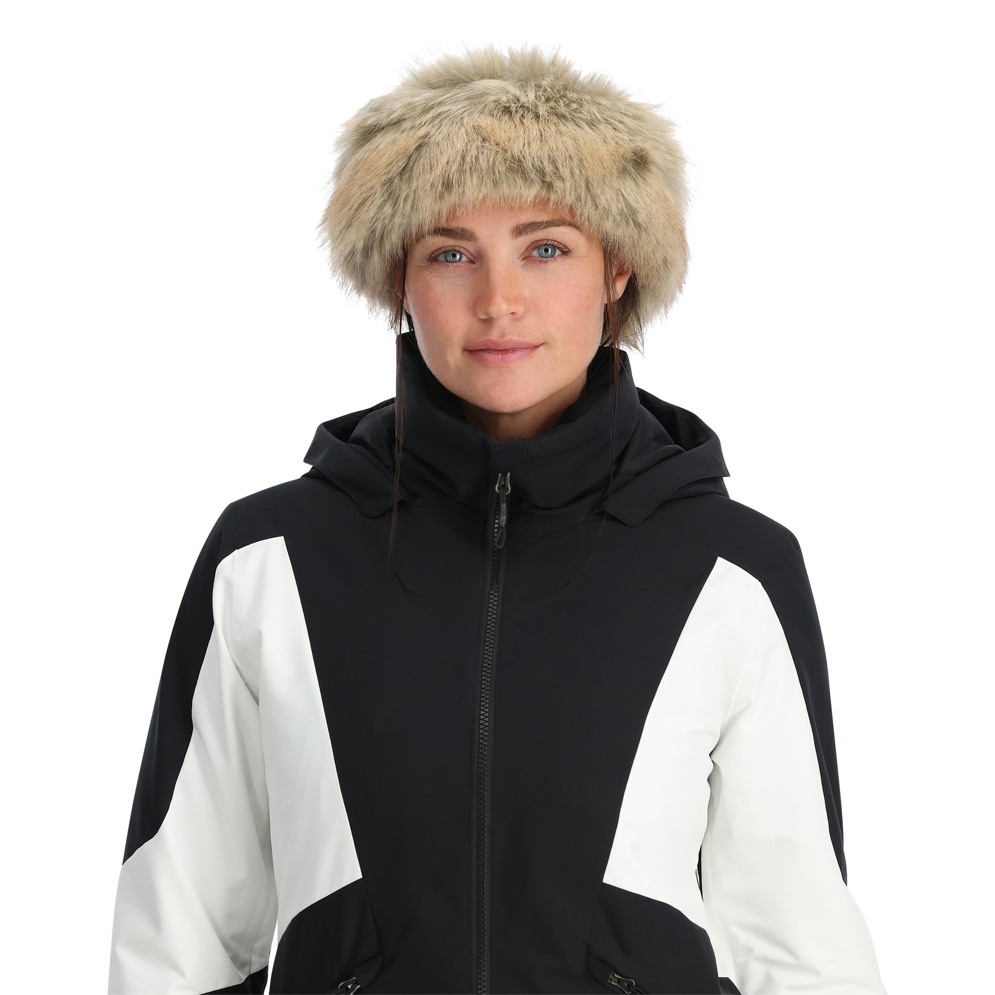 Spyder Women's Vida Insulated Faux Fur Jacket - A black and white jacket with a faux fur trim on the hood, featuring a zipper closure and two zippered pockets.