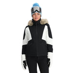 Spyder Women's Vida Insulated Faux Fur Jacket 2025 - A black and white jacket with a faux fur hood trim, featuring a zippered front closure.