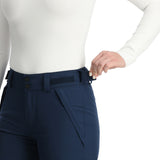 Spyder Women's Section Insulated Pants 2025 - A pair of navy blue insulated ski pants with a black waistband and belt loops.