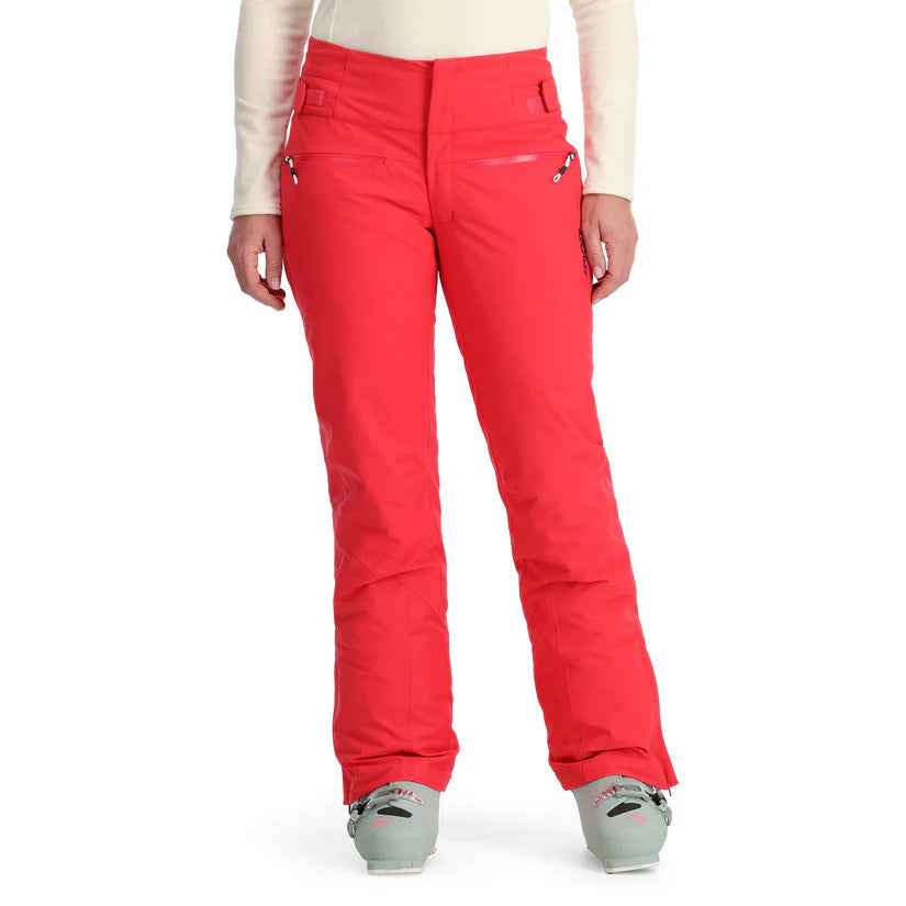 Spyder Women's Winner Insulated Pants 2025 - Solid red pants with zippered pockets and a belt loop on the waistband.