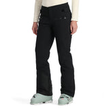 Spyder Women's Winner Insulated Pants 2025 - Black ski pants with a zippered pocket on the right thigh and adjustable Velcro straps at the waistband.