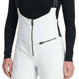 Spyder Women's Strutt Softshell Bibs - White bibs with a black zipper and gray logo on the left leg.