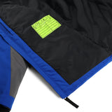 Spyder Boys' Turner Insulated Jacket - A black jacket with a white logo on the left chest and gray accents around the waist, cuffs, and hood.