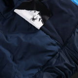 Spyder Boys' Leader Insulated Jacket 2025 - A navy blue jacket with a white logo on the left chest and a black zipper.
