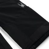 Spyder Boys' Expedition Insulated Bib Pant 2025 - Black bib pant with white logo on left thigh and black elastic waistband.