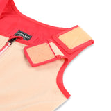 Spyder Girls' Expedition Insulated Bib Pant 2025 - A pink and black bib pant with a white logo on the left leg.