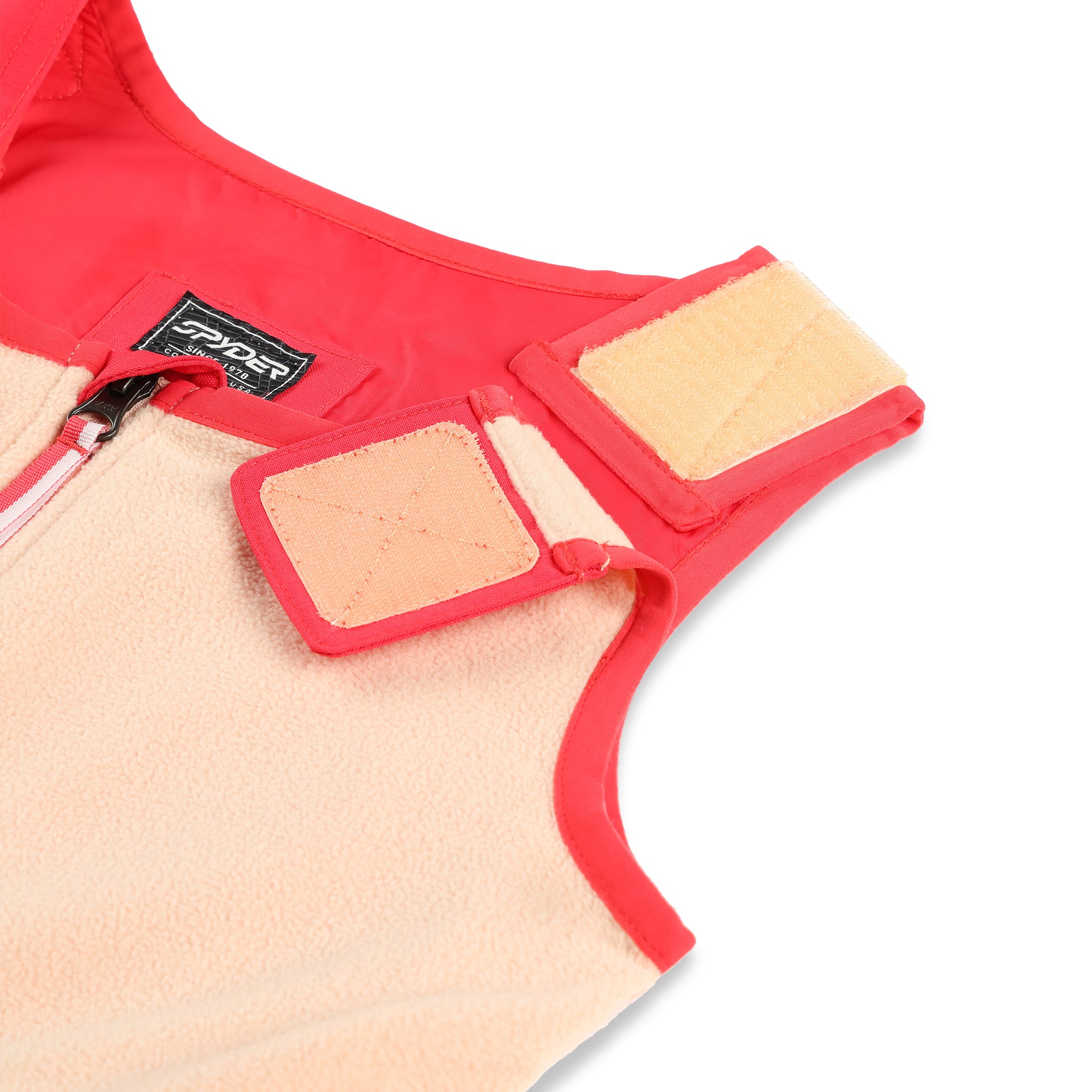 Spyder Girls' Expedition Insulated Bib Pant 2025 - A pink and black bib pant with a white logo on the left leg.