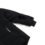 Spyder Girls' Zadie Synthetic Down Jacket - A black down jacket with a zippered chest pocket and two side pockets, featuring a hood and adjustable cuffs.