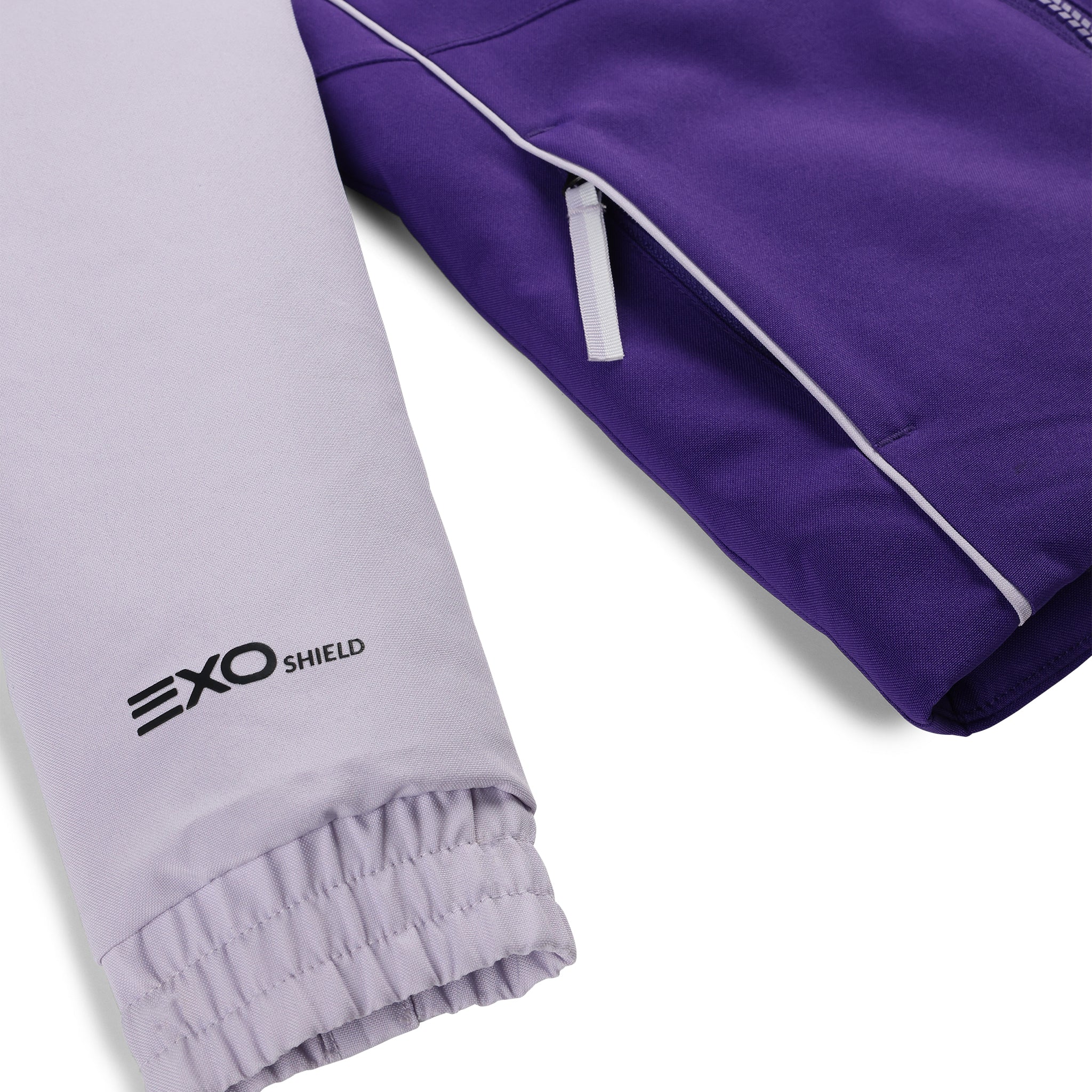 Spyder Youth Conquer Insulated Jacket 2025 - A light purple jacket with a darker purple logo on the chest and white accents around the zipper.