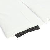 Spyder Junior Girls' Revel Insulated Pants 2025 - White insulated ski pants with a black elastic waistband and zippered pockets.