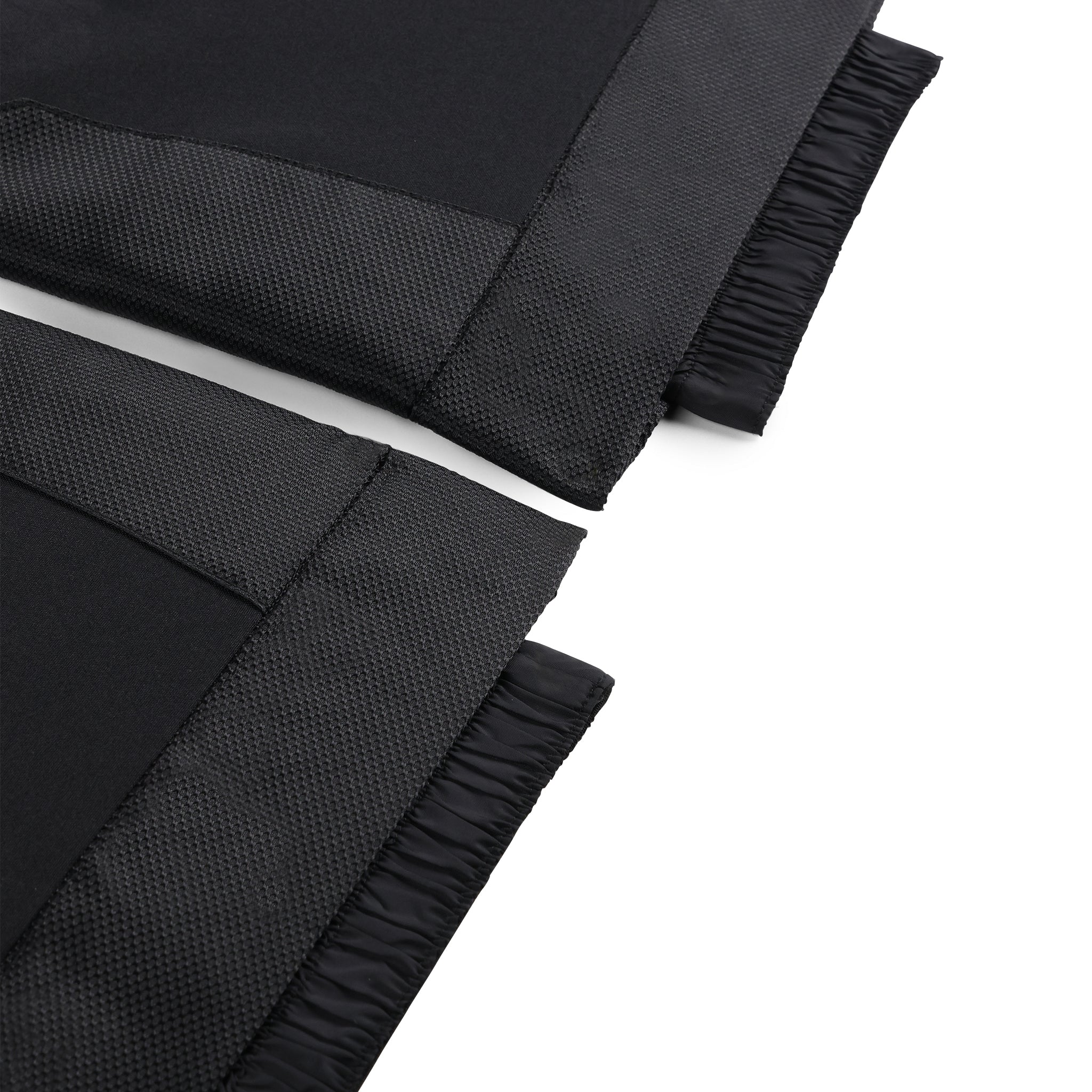 Spyder Girls' Olympia Insulated Pant 2025 - Black insulated ski pants with a textured pattern on the lower leg and black elastic cuffs at the ankles.