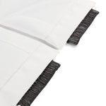 Spyder Girls' Olympia Insulated Pant 2025 - White snow pants with a textured pattern on the side of one leg.