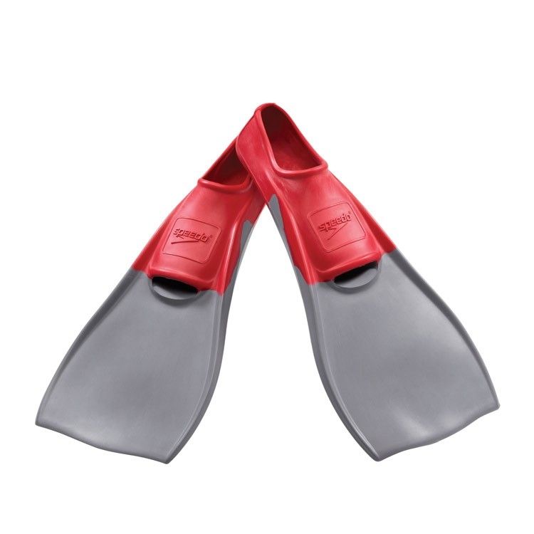Speedo Trialon Rubber Swim Fins - Red rubber swim fins with a textured pattern on the foot pocket and a strap at the heel.