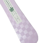 Arbor Women's Cadence Snowboard 2026 - A light purple snowboard with a checkered pattern and a butterfly logo on the top left corner.