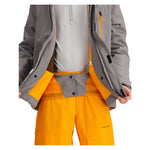 Obermeyer Junior's Insulated Gentleman's Jacket - A grey and orange insulated jacket with a zippered front, worn by an unseen model.