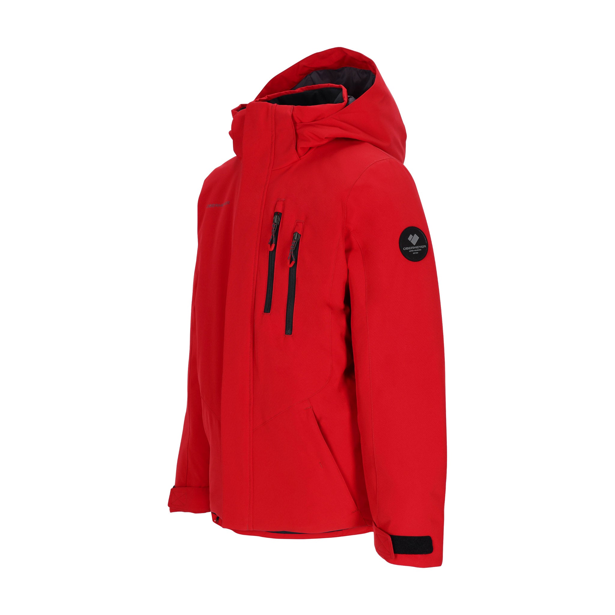 Obermeyer Junior's Insulated Gent's Jacket 2025 - A red jacket with a hood, featuring two zippered pockets on the front and a black logo patch on the left sleeve.
