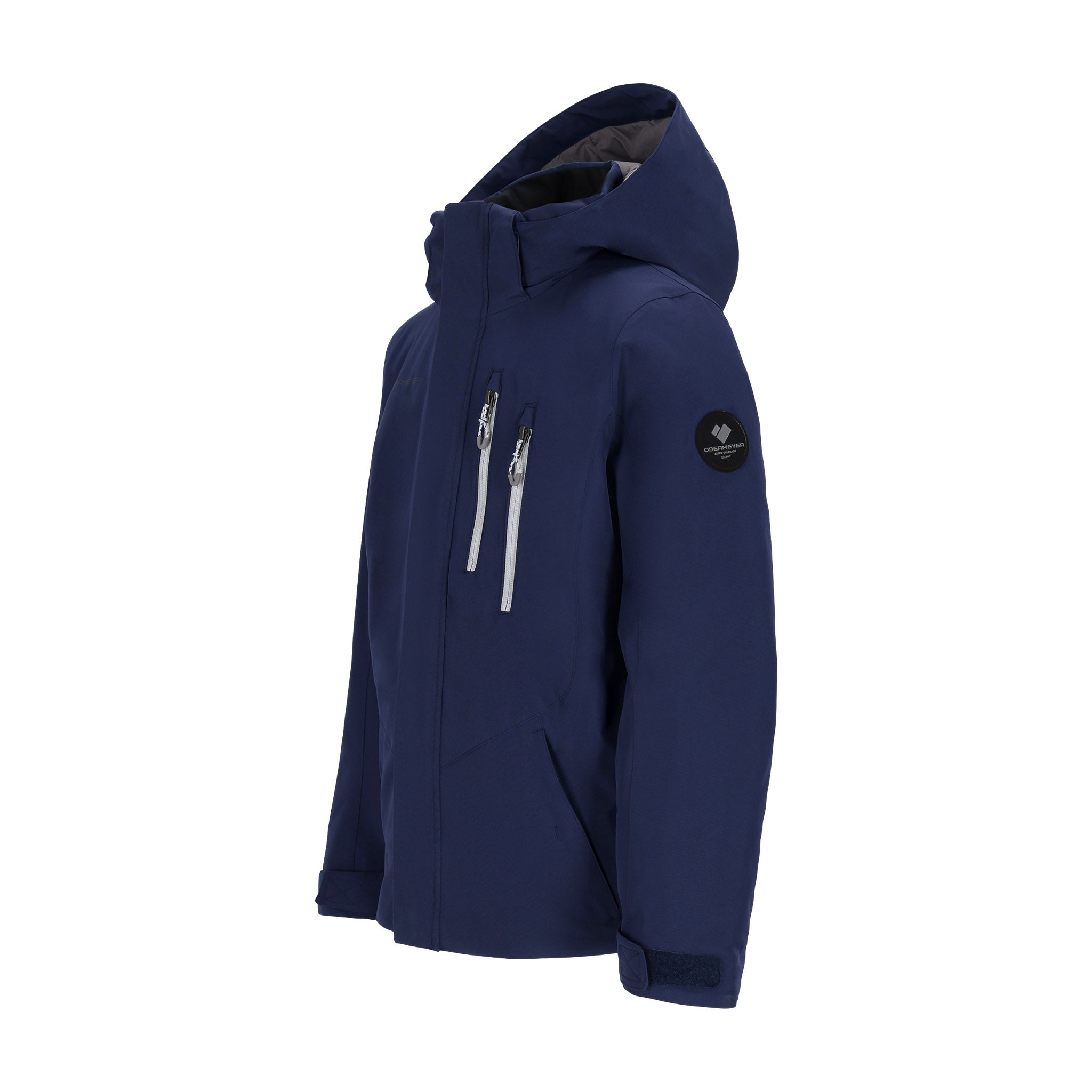 Obermeyer Junior's Insulated Gent's Jacket 2025 - A navy blue jacket with a hood, featuring two zippered pockets on the front and a black logo patch on the left sleeve.