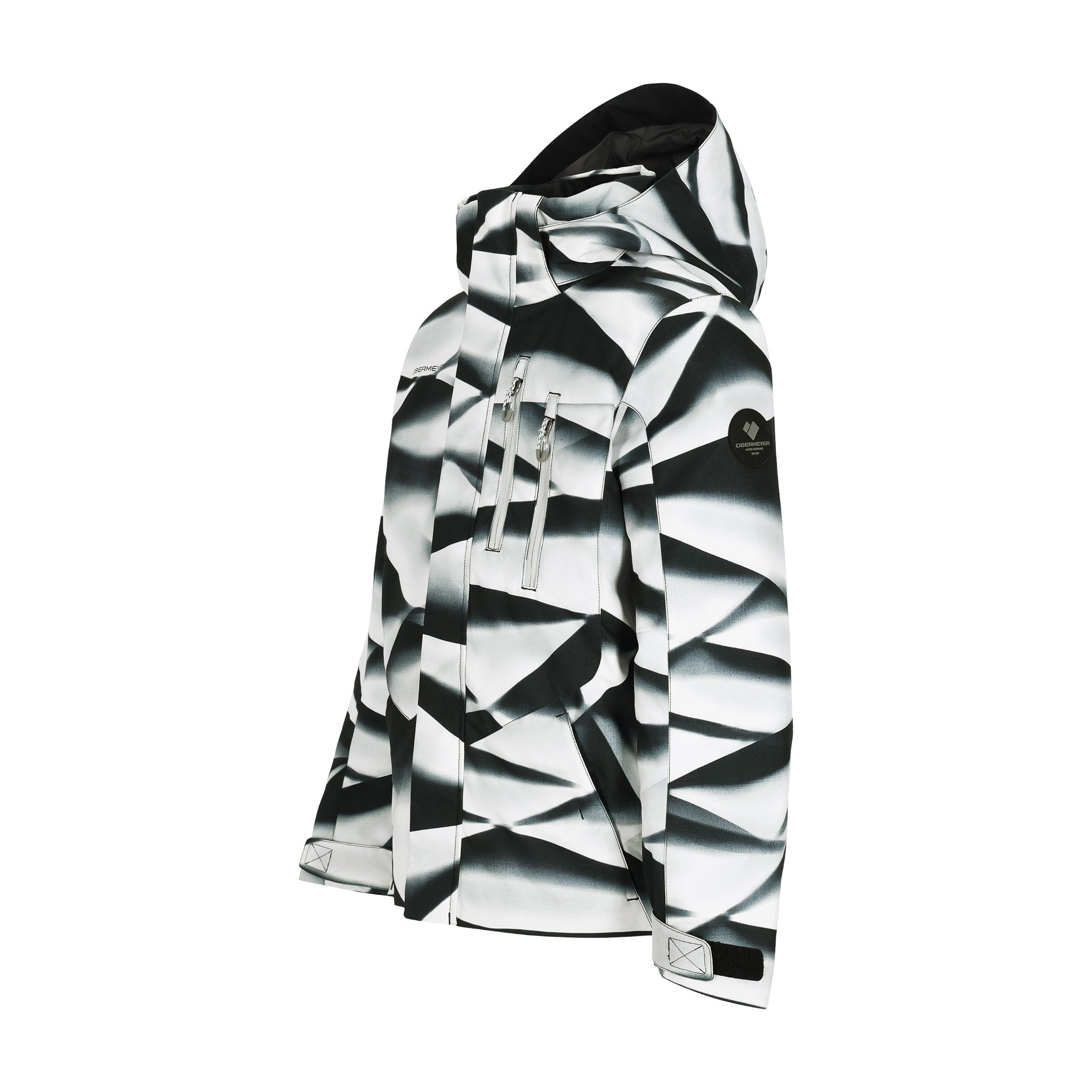Obermeyer Junior's Insulated Gent's Jacket 2025 - A black and white jacket with a geometric pattern, featuring a hood and two zippered pockets on the front.
