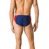 Speedo Spark Splice Brief Swimsuit - A red, blue, and white swimsuit with a geometric pattern on the front.